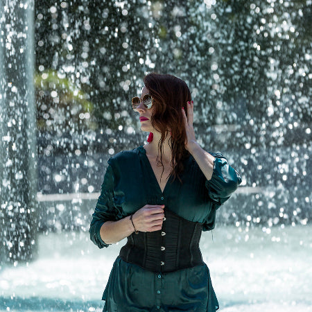 Green satin skirt on the sun