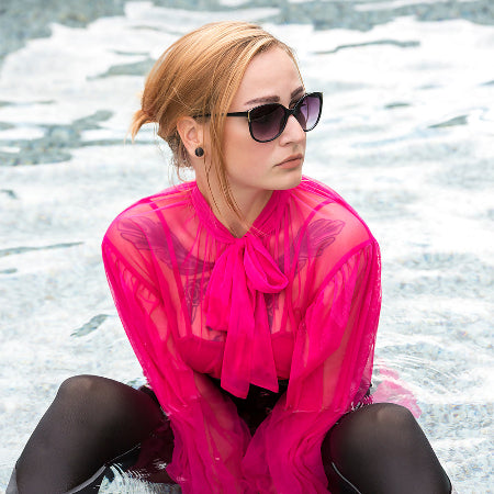 aNEW Purple shirt in a fountain